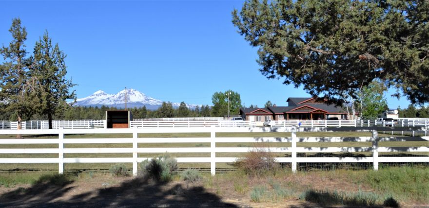 Remarkable Mountain Views on 9.67 acres just outside of Sisters, Oregon. Exceptional property with over 7 acres of irrigation from privately owned water rights
from own private well, 8 stall barn and 62 x 72 sqft indoor arena. Property is fenced and cross fenced with white vinyl fencing adding character and charm. Interior
finishes include solid knotty alder doors and trim, vaulted ceilings with rustic beams with tounge and groove accents, stone fireplace, knotty alder cabinetry and granite
counter tops throughout. Expansive mountain views greet the back patio and balcony for unmatched summer living. RV parking with electrical hookups and septic dump.
Home is currently rented to long term tenant. DO NOT Disturb tenant. Showings to take place after tenant has vacated property.