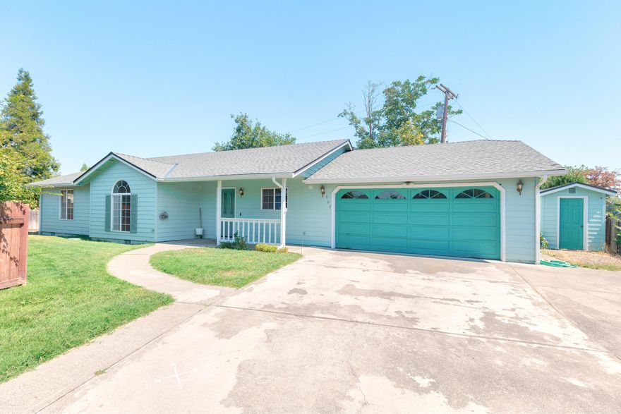 Welcome home! This cute 3 bedroom, 2 bath single level home sits on a flag lot in a quiet cul-de-sac, zoned for the desirable District 7 schools. Inside you'll find large bedrooms, a spacious living room with vaulted ceilings, and updated laminate flooring. The kitchen features cabinet pull-outs and plenty of storage. 

The oversized 2-car garage with built-in cabinets and workspace is perfect for projects and additional storage. There's also an insulated shed with power and RV parking with alley access. This move-in ready home has a newer roof and paint and is the perfect blend of comfort and convenience.