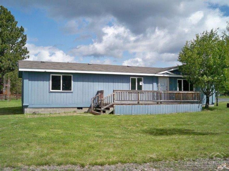 2-bedroom, 2-bath with 1456 sq ft of living area. Large 1/2+ acre lot. Private quiet street. Detached 2-car garage with shop area. Large kitchen area, bonus room. Nice deck on front of home. Room for RV's and more.