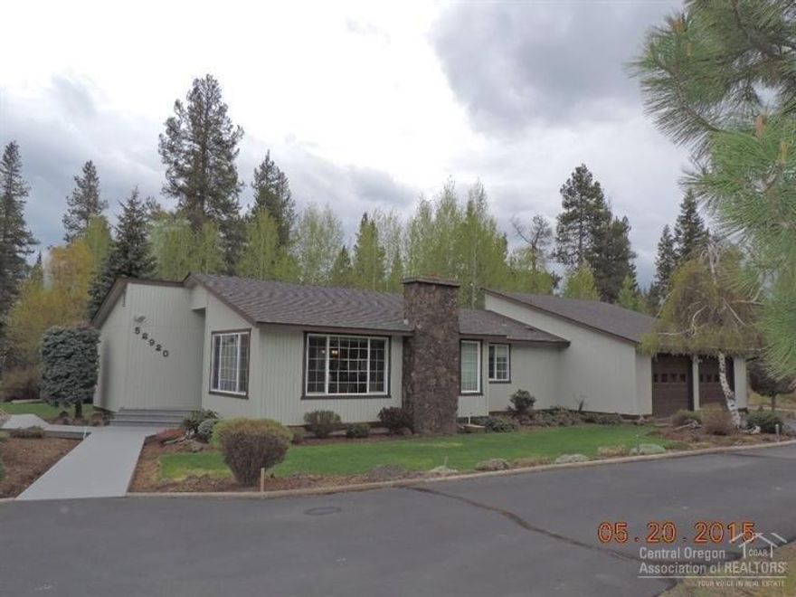 Classic 1970's style w/vaults & dark wood beams & moldings. Super-efficient Geo-Thermal heat pump system & real fireplace. 2+ acre corner lot. Paved pull thru driveway, attached 2 car garage PLUS 3-Bay 38X30 Shop! Covered back patio, In-ground sprinklers, lawn w/mature but pristine landscaping & Trex deck walkways. Many recent updates: laminate & tile flooring, tiled master shower, int. doors, exterior paint. Great office area & extra bedroom w/adj. room for who knows what! UBER CLEAN! Seller motivated!