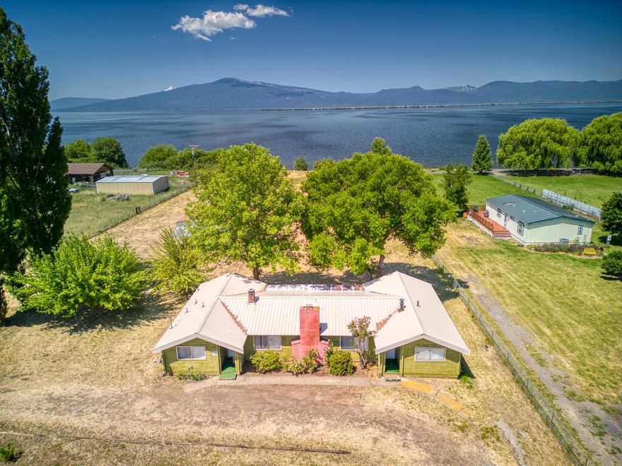 Agency Lake Waterfront!! Have your own beach on the lake- 1.7 acres with 1572 SF 3 bedroom/1.5 bath stick-built home and 952 SF detached garage/shop. Room for a horse pasture or other animals or just enjoy being on the lake looking at the mountains. Clear Pest & Dry Rot and new septic tank!!! Close to Crater Lake, Fort Klamath, Williamson and Sprague Rivers for kayaking, hiking, boating, hunting, horseback riding, etc. -- approx 30 minute drive to Klamath Falls, Oregon.