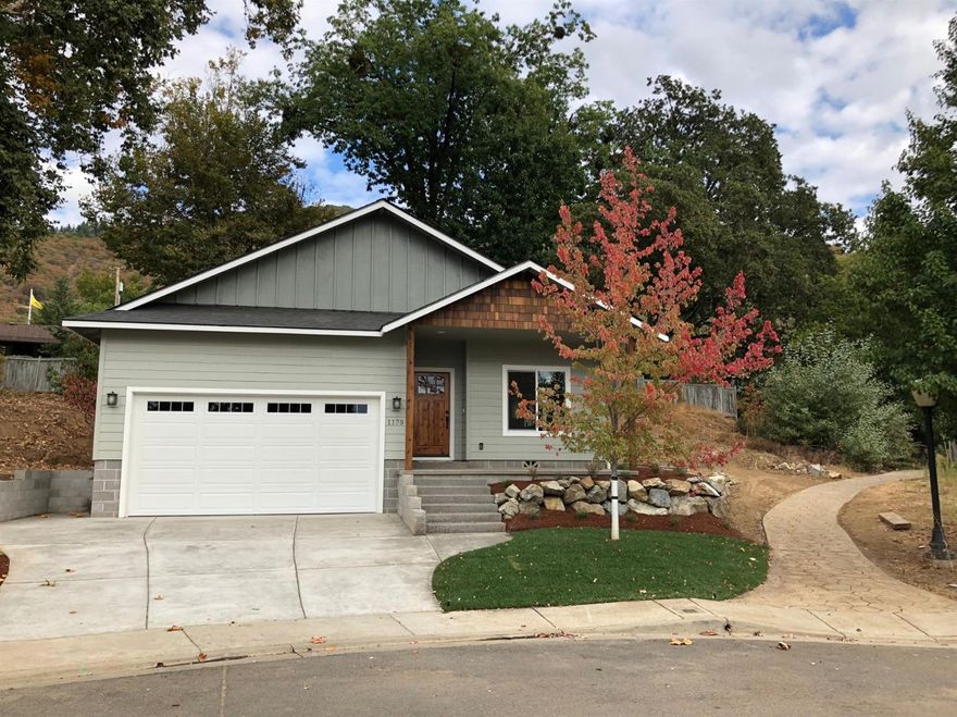 One of a kind! Located in a very desirable neighborhood in NE Grants Pass, this beautiful two bedroom/two bath home boasts an efficient, single level floor plan with upgraded finishes. Enjoy the views of the valley, the quiet cul-de-sac location and the bonus common area right next door with a covered gazebo for larger gatherings. Manageable in size, efficient use of space, two car garage and located in an area of upscale homes a rare combination for the discerning buyer.