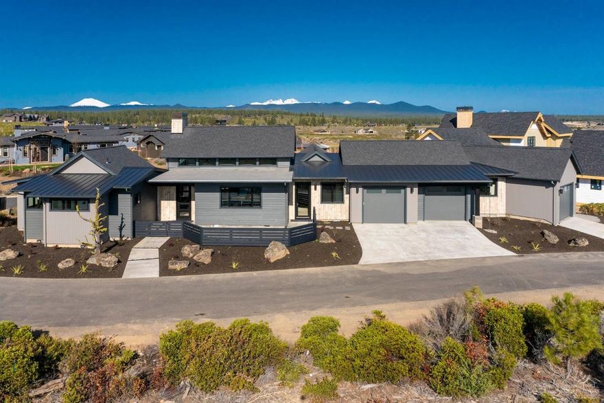 Custom designed to maximize the setting of a gorgeous Tetherow lot in the beautiful Cascade Vista neighborhood, this contemporary farmhouse inspired design incorporates an open floor plan with oversized doors and windows throughout. An Earth Advantage home, it features: vaulted ceilings, Western facing exposure, high end finishes and outdoor access to patios from the living spaces and each of the bedrooms. This single level 3 Bed, 3.5 Bath is complete with an included golf membership, a 3 car garage, expansive patio and outdoor living space. Golf Membership Initiation included!