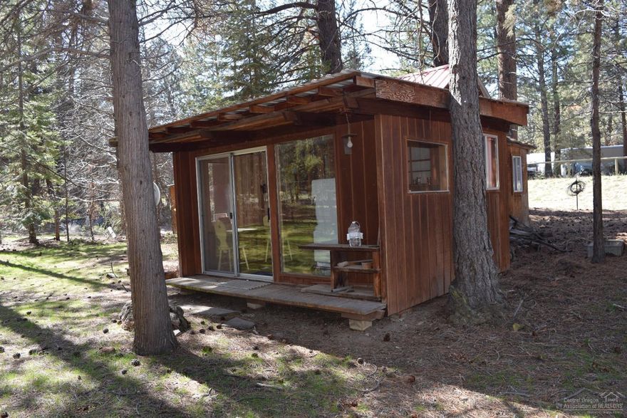 1st time on the market in many years. Small cabin close to Bend. 10,000 gallon Cistern Horses O.K. Very quiet location. It's all about location and future development possibilities. Priced for the land. 3 stall barn and small storage building. Truly a gem and worth the short drive. Come see for yourself.