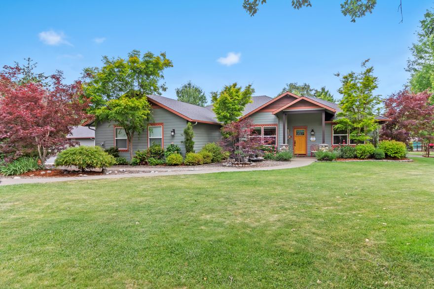 Welcome to your private rural retreat! This one-owner, single-level custom home built in 2010, combines elegance, comfort, and everyday functionality. With 3 bedrooms, 2 baths, an office, and a 660 sf detached workshop (with A/C, heat, cable, & a half bath), this property is designed for true flexibility. Set on 2.5 fully fenced and cross-fenced, landscaped acres with gated entry and 16-ft field gate, you'll enjoy both privacy and usable space. Inside, 9-ft ceilings, archways, hickory hardwood floors, and ceiling fans. The living room impresses with soaring 14-ft vaulted ceiling & river rock fireplace, perfect for cozy evenings. The kitchen features granite countertops, hickory cabinets, walk-in pantry, abundant natural light, and open flow to the dining & living areas. Completing the home are an attached 3-car garage, four custom sheds, fire pit, hot tub on the privacy patio, bubbling water feature, & a strong producing private well. Move in ready -- all appliances included!