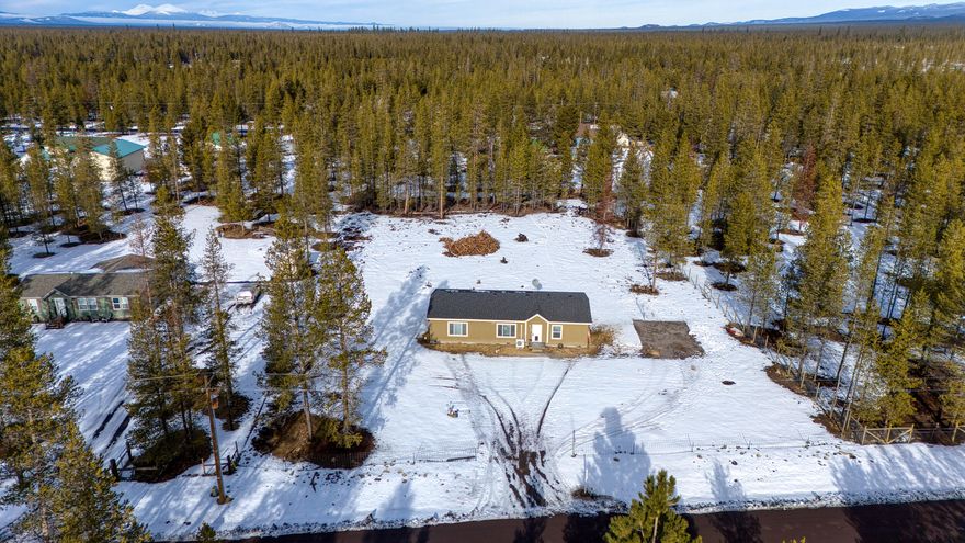 PRICED TO SELL! **Home is being sold as-is and will be subject to third-party approval.** Welcome to Sun Forest Estates! This 3 bedroom, 2 bathroom manufactured home built by Parsons Construction Inc. in 2022 offers 1,512 square feet of open living space with a split living floor plan. It is situated on 1.12 fenced and gated acres, has RV Parking with Electric Hookup, and ample space to build additional storage. As a newer home, this property is move-in-ready so come take a look today!