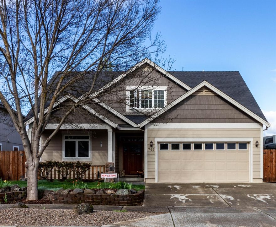 Gorgeous *Better than New Home* 4 True Bedrooms (Master Suite on Main Level) in an Excellent Neighborhood. Extremely well cared-for - Too many upgrades to list all - Large 2-car attached garage, RV parking, gorgeous back yard with custom log railing, hot tub, front & back yards are beautiful w/timed sprinklers & custom-built storage building. This open floor plan home has it all, from the huge living room with soaring vaulted ceilings & gas fireplace with tile surround to the large downstairs master suite with large bathroom including double sinks, walk-in shower & big walk-in closet; to the wonderful kitchen with custom cabinetry, granite counter tops, high-end stainless steel appliances w/peninsula. Energy efficient, zoned natural gas heating upstairs & down; large laundry room with sink & cabinetry; tile flooring in the entry, kitchen, laundry & baths; +more bedrooms w/additional storage upstairs, the list just keeps goingEnjoy entertaining in the amazing back yard.