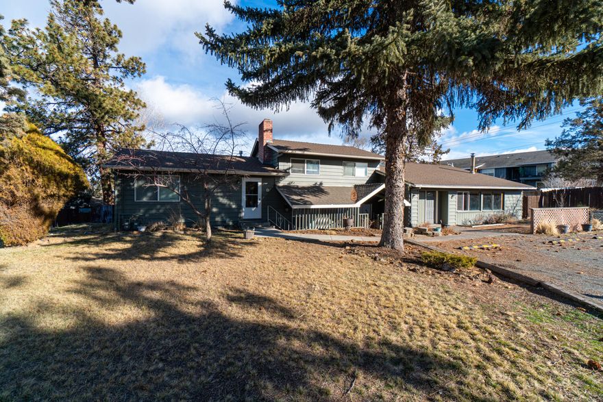 Turn key rental property w/upside potential or develop into high density, affordable housing in the heart of Bend.  Turn key unites & plenty of space for additional dwellings/expansion. Get familiar w/House Bill 2001 - this property is eligible for high density! Triplex is connected to city water & sewer with two power meters. 3/1, 1/1, 2/1.5 bed/bath units, east most unit currently vacant for first week on market, then to be rented. Included are the refrigerators, ranges, washers, dryers & 1 wood burning stove, 2 fireplaces. New exterior paint in 2020 & roof replaced in 2018. Plenty of parking & 2 RV storage spaces. Your chance to own nearly an acre if purchased with 61555 Alstrup! This opens up additional development opportunities for the savvy investor - City of Bend is excited to partner in increasing density! *** Please do not disturb tenants ***