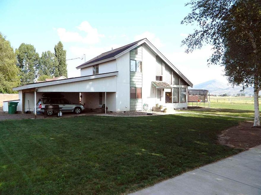 This Is A Great Property On The Edge Of Town. The House Is A 3 Bed 2 Bath With A 26x50 Shop On The Property. There Is 1.18 Acres Of Ground With Plenty Of Room For The 4h Project. There Is Eid Irrigation And A Garden Area For The Green Thumb. It Is Located On A Dead End Street For Limited Traffic. The Wood Stove Is Certified And Can Reduce Heating Costs Tremendously.