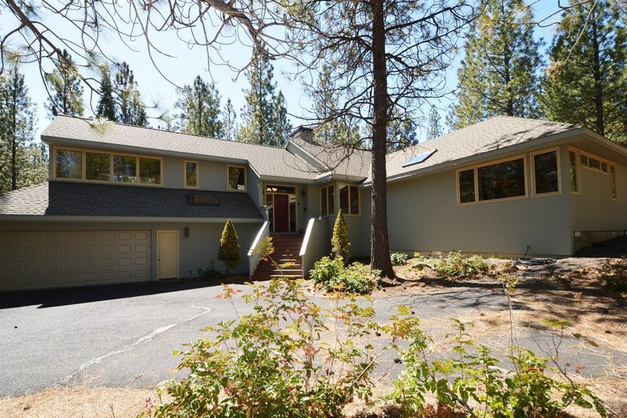 Private and tranquil at Black Butte Ranch. Located in the Glaze Meadow section of the ranch, bordering the forest, this recently updated home features 5 bedrooms, (3 with en suite baths), 4 baths, large open kitchen with granite counters and SS appliances, great room with floor to ceiling rock fireplace, loft with cozy woodstove, utility, attached oversized two car garage. Decks wrap around the home and being at the end of the cul de sac, it is a very private setting...