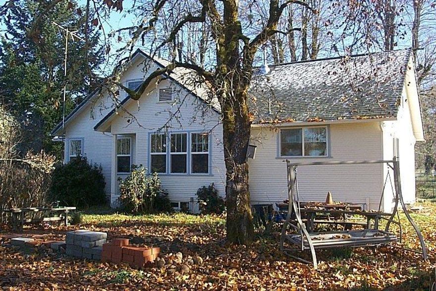 Here is the perfect setting for farm, vineyard or? There is 136.33 ac. (3 tax lots) that is fenced & x-fenced for rotation of crops or animals. The current usage is about 120 ac. tillable in pasture & hay. OLD 1856 & 1870 water rights for approx. 125 ac. Extensive irrigation system with a 25 hp 3 phase pump at point of diversion. There are over 130 movable Irripods that attach to lateral buried lines. System is capable of about 800 GPM. Pole Barn is about 4300 sq. ft - equipment shed is approx. 576 sq. ft. The farm house is a 2 story, remodeled in 2003- 1 bdrm / 1.5 bathroom on main floor. Upstairs is a finished - wide open space but could be portioned off for more bedrooms. The basement has potential with some work to become more space in the home. The home has its own well & septic system. 2 enclosed lockable sheds are near the house for garden tools & power equipment. Come & check out this beautiful ranch for yourself!