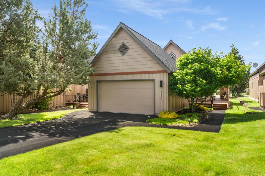 Discover rustic elegance in this charming chalet nestled within Eagle Crest Resort. This delightful two-bedroom, two-bathroom retreat boasts soaring vaulted ceilings with abundant natural light.
The upper level features a spacious primary bedroom with convenient double vanities and a walk-in shower. Adjacent is a thoughtfully designed loft with built-in desk—perfect for remote work or creative pursuits.
Downstairs, you'll find a comfortable second bedroom, full bathroom, and practical laundry room. The kitchen showcases newer appliances within an open-concept layout ideal for entertaining.
Outside you will enjoy the covered Trek deck offering picturesque views of 14th tee on The Ridge Course. A detached two-car garage provides ample storage space.
This mostly furnished property offers both comfort and convenience—your ticket to resort living where recreation and relaxation blend seamlessly.