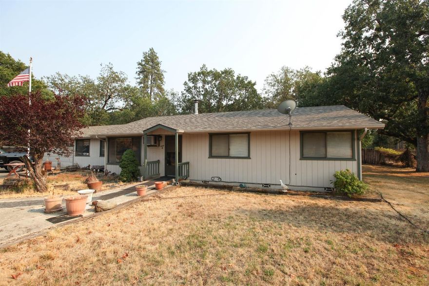 This incredible property in a highly desired neighborhood. This 3 bedroom 2 bath home has a large 2 car garage on 2.5 acres. There is a bonus large family room (may have been a garage conversion) that could easily be turned into another bedroom or two. The very large swimming pool needs a new liner and some work, but seller will credit $5000 towards a new liner and repairs to get the pool back to usable. The home needs updating but can be spectacular with a little work. Home should finance with no issues and is move in ready.