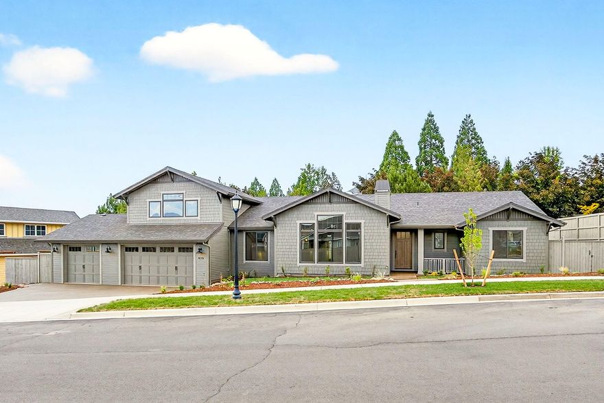 Stunning new construction home in the highly desired Summerfield Subdivision in East Medford. This residence offers an open floor plan with all main-level living and a bonus room upstairs. The bonus room has a bathroom and could be used as another bedroom. The spacious kitchen has a large island, butler's pantry, quartz counters, Kitchen aid appliances, and soft close drawers. The main-level primary suite boasts a spa-like bathroom with a double vanity, floating tub, walk-in shower, and a large walk-in closet. Additional features include a gas fireplace with built-in wood cabinets, real engineered hardwood floors, and excellent lighting throughout. Designed for both style and functionality, the home offers 3 1/2 bathrooms, carpeted bedrooms, and tile in the bathrooms and laundry room. The outside of this home offers a generous covered back patio and a private backyard. More highlights include the 3-car garage and its great curb appeal.   The listing agent is related to the seller