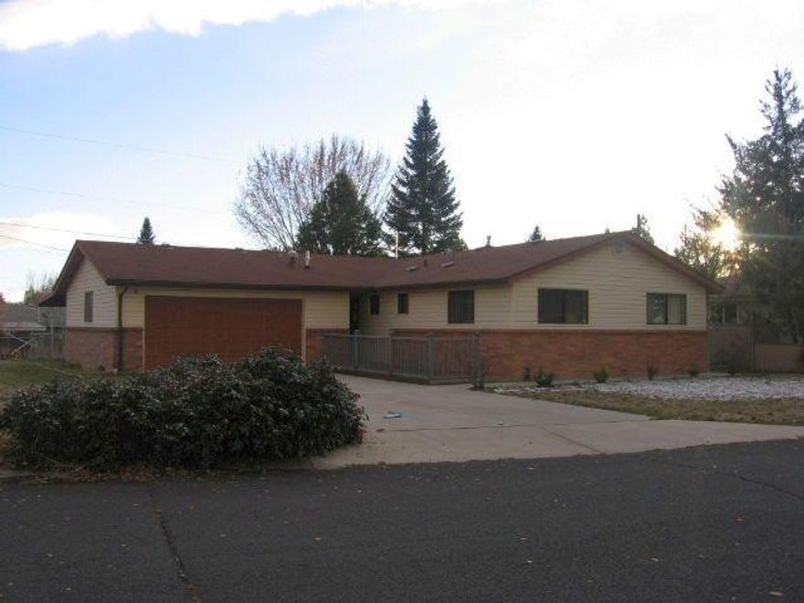 Nice Home In The Suburbs Across From Shasta Elementary. Vacant And Ready For A New Owner! Beautiful Hardwood Floors In The Kitchen, Nice Layout And Large Bedrooms. Gas Log Fireplace In The Living Room For These Cold Nights! Private Alley Access, Fenced Backyard, And A Covered Patio Too!