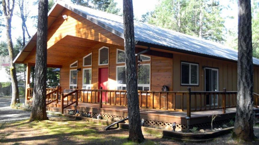 Country Living, but on the edge of city limits, sits this beautiful Craftsman home, with so much appeal. Enjoy the entrance to property and see the home situated among the beautiful tall fir trees. Cedar Wood front and huge cover that hovers over a recently renovated deck that wraps around to the side of home. Large open floor plan in the living room,dining area and living room. Lots of natural lighting from the windows that face in a southerly direction. Every room in the home has its own character, and are spacious, nicely decorated with eye pleasing colors. Baths are both good size and Master bd. has a walk in closet. Attached garage, is 528 Sq ft and has finished interior w/gar door opener. Sep. shop (or gar for a smaller car, tractor or ?. Awning on the shop is an extension of the roof line, & good for wood storage, boat, or your own ideas. Large Garden area & Orchard area are sep. fenced (deer proof). Orchard has several mature fruit trees. Close to town conveniences!