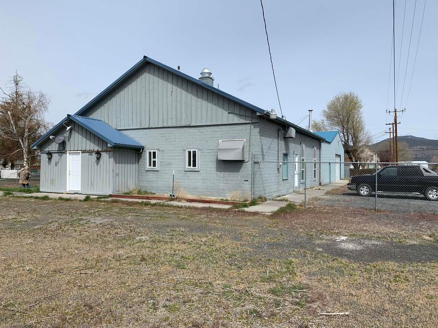 This sale is subject to the following - Sale subject to probate of the Estate of Charles V Case. Property has been sold in an AS-IS condition. This 3 bed/2 bath, fully fenced property in the town of Merrill that sits on approx. .5 acre. Property is zoned Commercial Improved. Has an attached oversized shop with lots of storage.