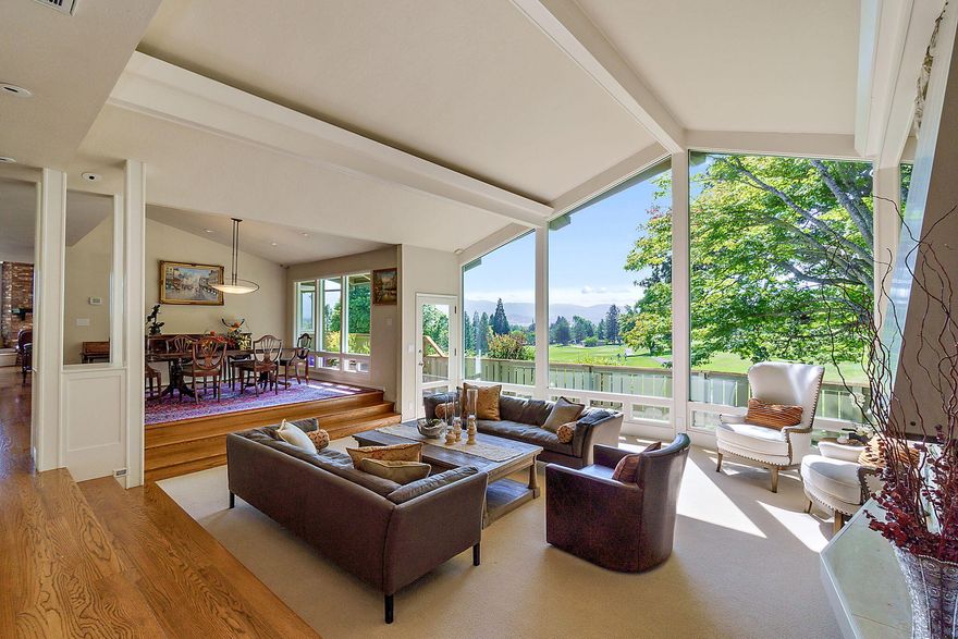 LOCATION and VIEWS! Exquisite home overlooking the 13th green of RVCC. This 4 bed, 3.5 bath home offers luxury and practicality with PANORAMIC VIEWS! On the main floor you'll find a chef's kitchen w/ gas cooktop, granite counters, and stainless-steel appliances. The large primary suite has automatic blinds, heated bathroom floors, air jet tub, and a custom walk-in closet. A half bath off the kitchen, 2 guest bedrooms (or home office), full guest bath, and 2 gas fireplaces - don't miss the finished attic, fun for kids or storage. Downstairs has guest quarters w/ full bath, guest room, magnificent wine cellar, large wet bar (possible kitchenette) and living area. Enjoy the oversized 2 car garage, and added parking for a golf cart or other toys. Large deck for entertaining, gorgeous swimming pool (new electric cover), and course access. Designed by renowned architect Alex Diepenbrock, the home has been tastefully remodeled with attention to detail and an eye for quality. Come tour today!