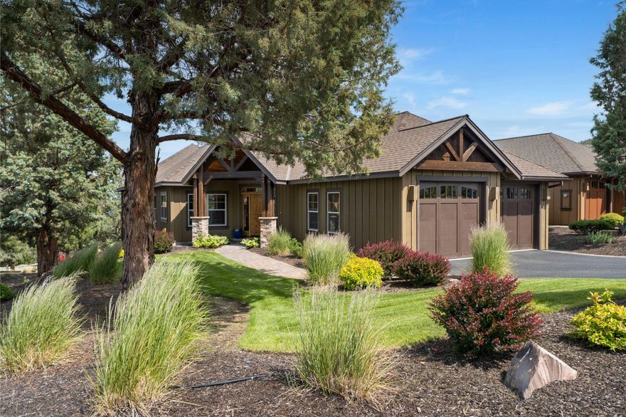 Northwest Craftsman perched on Vista Rim in Eagle Crest Resort, where you'll wake up to breathtaking easterly views of Smith Rock, Gray Butte, and the Ochoco Mountains. 

The main floor welcomes you with solid hickory floors, gorgeous knotty alder cabinetry, and hand-troweled walls.

The great room features a soaring cathedral ceiling and a floor-to-ceiling stacked stone fireplace. 

The chef's kitchen boasts slab granite countertops, an expansive island with breakfast bar, a gas cooktop, stainless appliances, and a spacious pantry.

Retreat to the luxurious primary bedroom with its tray ceiling, ambient lighting, cozy gas fireplace, and spa-like ensuite featuring a soaking tub, dual vanities, and separate shower. Move outside to the covered deck where Central Oregon's famous sunrises and star-filled skies await.

The lower level offers a bonus room with wet bar, additional guest room with ensuite, and plenty of storage. 

Near Lakeside Sports Center and paths.