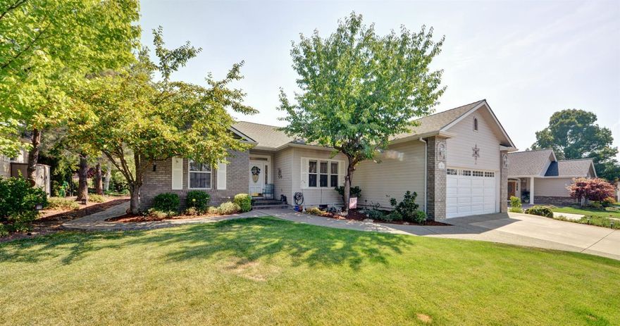 Beautiful Eagle Point Golf course home. This well maintained custom home has golf course frontage with views of the 7th fairway. Sit on your patio and enjoy the gorgeous views of the mountains. Great for entertaining this large kitchen has custom cabinets, granite counters and open to the huge living room. Vaulted ceilings in the living room, bamboo floor, gas fire place and large windows to enjoy the views. Split floor plan, Large master bedroom with walk in closet, master bath has double sinks, jetted tub and large shower. Formal dinning room/den or office, tank-less gas water heater, stamped concrete walkways, beautiful landscaping,wrought iron fencing, Home Warranty included. This is a must see.