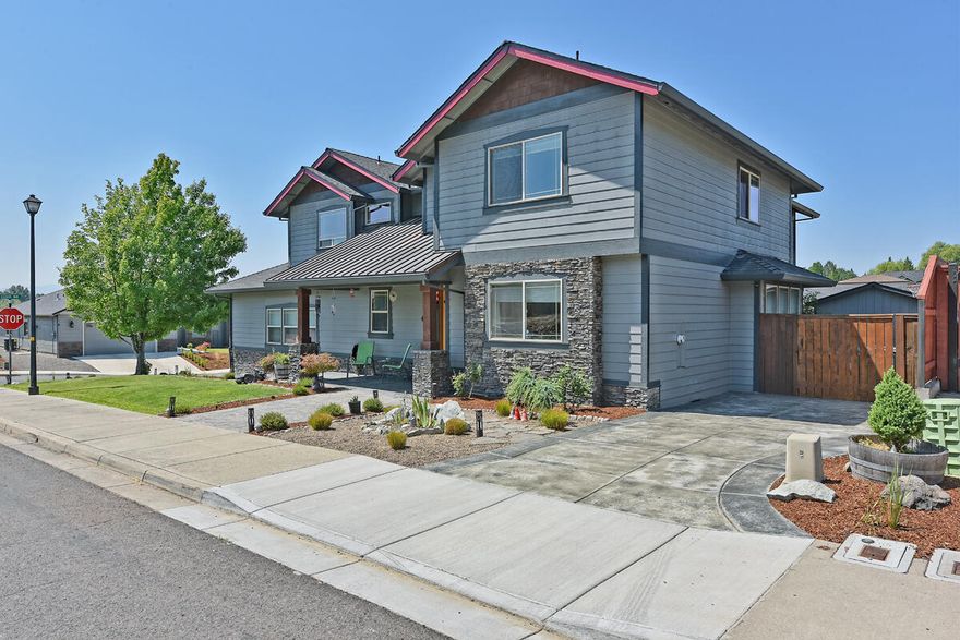 Stunning 4 bedroom 2.5 bathroom home in a highly desirable Eagle Point neighborhood close to the Eagle Point Golf Course. The home boasts 2,675 square feet and an open interior w/10'-18' ceilings, accent archways, and a wall of windows that flood the house w/natural light. The custom kitchen features an island w/breakfast bar, stainless steel appliances including an impressive Built-in Frigidaire Refrigerator, granite countertops, and oversized pantry. On the main level you'll find a half bathroom, and an office/den/additional bedroom w/a cozy fireplace. Upstairs are 2 guest bedrooms and an extra large master suite w/stunning views, a walk-in closet, a large soaking tub and double vanity. The house also boasts a meticulously maintained, oversized, finished 3-car garage w/shop area that includes a 1500lb shop lift, RV parking, a hot tub, a covered patio, and a large fenced-in back yard.  You can't beat the amenities this home offers!  First American Home Warranty included