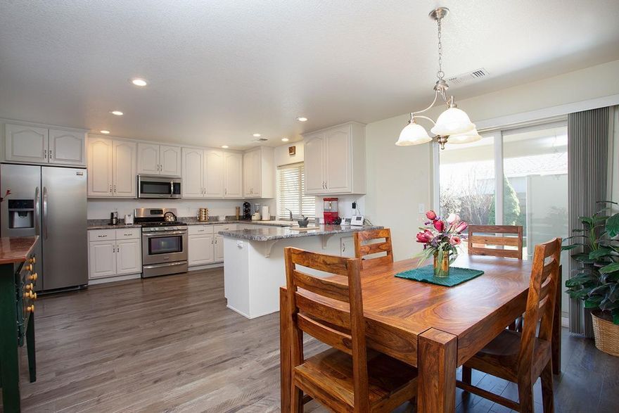 Super clean, move-in ready, solid single story home. Walk in to your open great room with vaulted ceilings. Entertain friends and family from the open kitchen. BBQ from your covered back patio that overlooks your fully fenced and well maintained backyard w/mature landscaping, or just relax and read a book next to your gas fireplace. Noted Features: Stainless Steel Appliances, Vaulted Great Room Ceiling, Walk-in master closet, 2 Car Finished Garage, Utility Sink, Covered Rear Patio, Private back yard, mature Landscaping. This one won't last long! 10 Min to Costco | 9 Min to Hospital | 8 Min to Parks