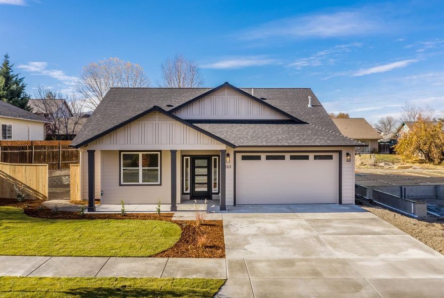 Introducing Marin Estates, located in beautiful Talent, OR. Quality & efficiently built brand new SINGLE LEVEL contemporary craftsman residences by Cota Homes LLC. Cota Homes is one of the premier local builder in the Rogue Valley w/over 35 years of experience. This home is 1,718 sqft w/3 beds & 2 baths w/a 2 car attached finished garage. Vaulted ceilings throughout, quartz counter tops, custom built Alder cabinets & gas fireplace. Kitchen includes stainless appl w/gas cook top, undermount farmhouse sink. Master suite w/walk in closet, master bath w/double sinks & beautiful tile work. 22 in garage is great for a car charger! Fully landscaped yard w/sprinklers & fencing. Room for a garden w/the larger .15 acre lot! 4 additional home sites available. Approx 4-5 mo. to build.