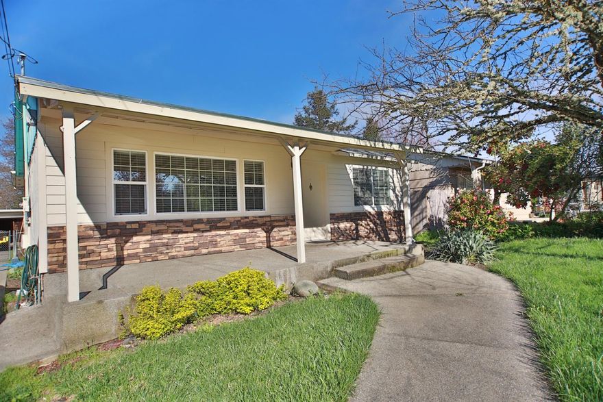 Great curb appeal and Lots of Potential in this 1600 sq ft, 3 bedroom 2 bathroom home. Some improvements have already been made, including the upstairs bonus/storage room. Large lot and a big backyard with a detached, two car garage/shop. Great location! Close to parks, shopping, schools, and town.