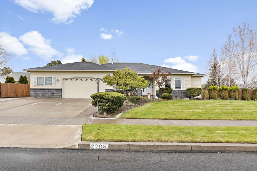 Here's what you've been waiting for!  Three bedrooms plus a large den / office and formal dining allow for plenty of room for everyone, and work at home options!  Shop attached to the garage offers endless possibilities for your hobbies, projects, and interests.  The quarter acre fenced lot allows room for RV parking behind the gate.  The yard also features a paver patio with pergola and electric awning to enjoy the outdoors all year long.  Perfect views of Pilot Butte from the den, dining room and front yard, so be ready to host the July 4th fireworks viewing!  This is a fantastic neighborhood with wide streets and well maintained homes.