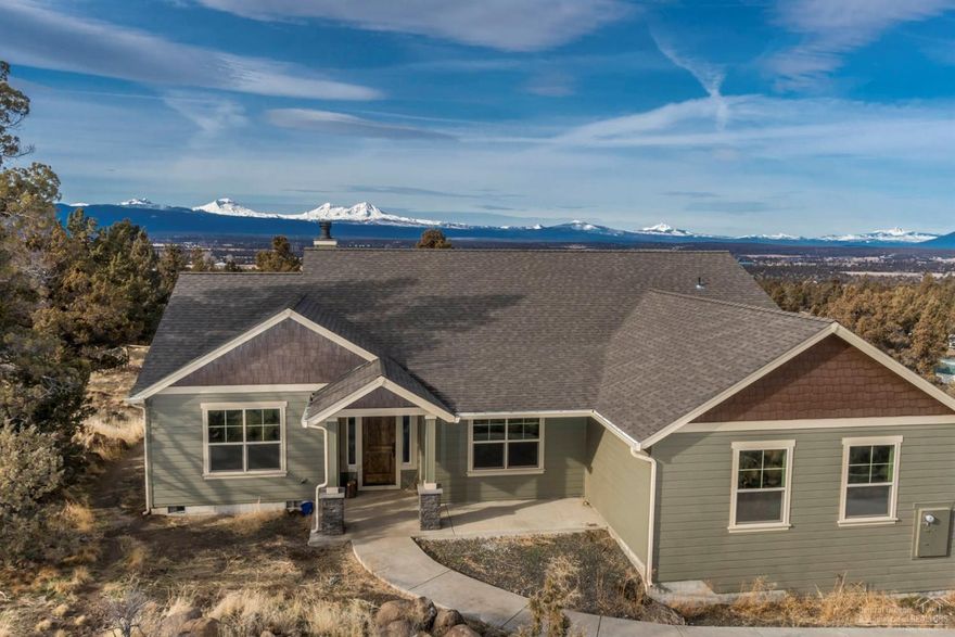 Magnificent Cascade Views!!!! Beautiful custom home located just outside of Tumalo, on 2.61 acres, completely fenced, potential horse property! This home offers an open floor plan with large vaults in the great room and master suit. Hard wood floors, built in cabinets, granite countertops, Kitchen Aid appliances, large windows opening to a beautiful mountain view and a newly built, large Trex back deck. This home offers a ton of opportunity to grow, with an unfinished basement (not included in sq footage).