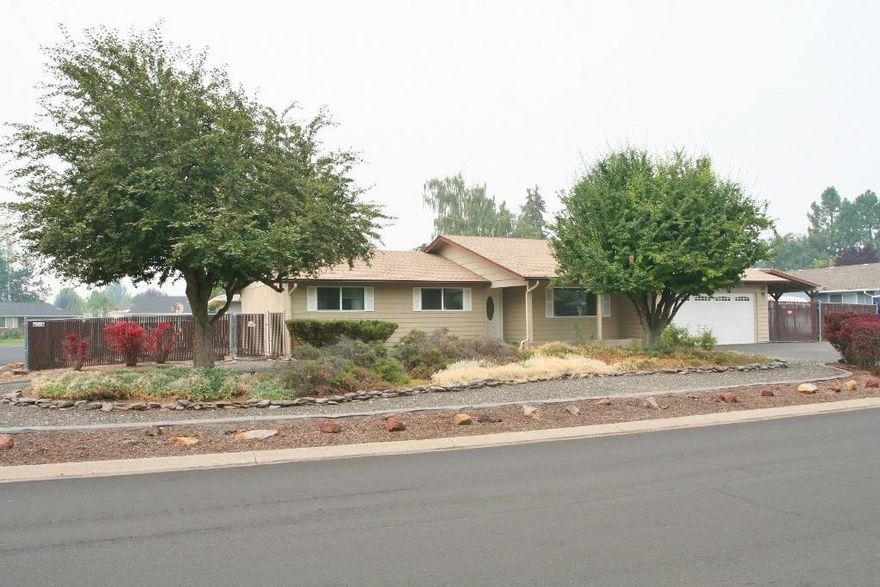 RV parking galore and low maintenance living at it's best! 3 beds & 2.5 baths that is super clean, well-cared for with maintenance records & move-in ready for new owners! Light & bright interiors, lots of tile flooring, attractive living room with gas fireplace, handy den off the kitchen, good sized bedrooms with lighted closets & mirrored doors, huge laundry room with adjacent half bath. Vinyl window, F/A gas heat & central A/C, new roof 2010, 2 car garage carport & abundant RV parking.