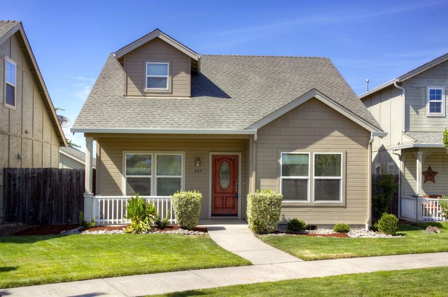 Clean and cute! Sweet 1400+sf home with 3 beds and 2 full baths. Brand new carpet and paint! Master Suite on the main level. Gas fireplace in the Living Room. Detached 2-car garage with alley access. Fully fenced back yard with sprinkler system. Don't miss it!