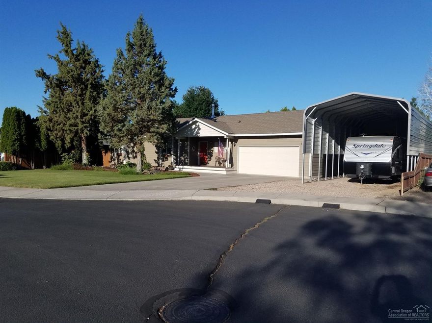 Additional 260 sf. enclosed patio area works great for office, den, exercise room. 16x40 covered RV area with 30 amp power. Home was repainted inside and out in 2017, new carpet and water proof vinyl plank flooring in 2016, completely remodeled kitchen in 2018 included all new appliances, ceiling high cabinets with soft close doors, drawers are full soft close as well, Granite counter tops and glass tile back splash. Double car garage features a 9x11 shop space and plenty of storage cabinets. 2 storage sheds in the back are 10x16 and 8x12.