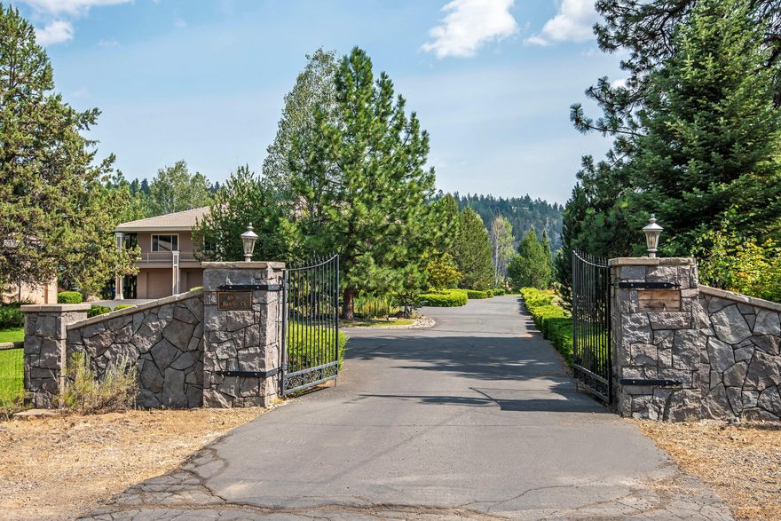 6500 sq ft home situated on beautiful Indian Ford Creek meadow, with Cascade Mountain views. On 10 acres, this would make a great horse facility, or first class vacation rental. Sleeps 18 as configured, but could easily sleep a lot more if the large rec room or theater room or huge storage room behind the garage were furnished with bunk beds.  The large detached shop/RV is heated and is plumbed for a half bath. Zoning is RR10, so due to recent legislation the property should become eligible for an Auxiliary Dwelling Unit (ADU). The residence has a media room, rec and exercise room, elevator, dumb waiter, and gourmet kitchen. Additional features include gated entry, paved street and driveway, grand stonework, large outdoor living areas, 2 heated bathroom floors, and much more. Exiting living spaces could be converted to additional bedrooms.