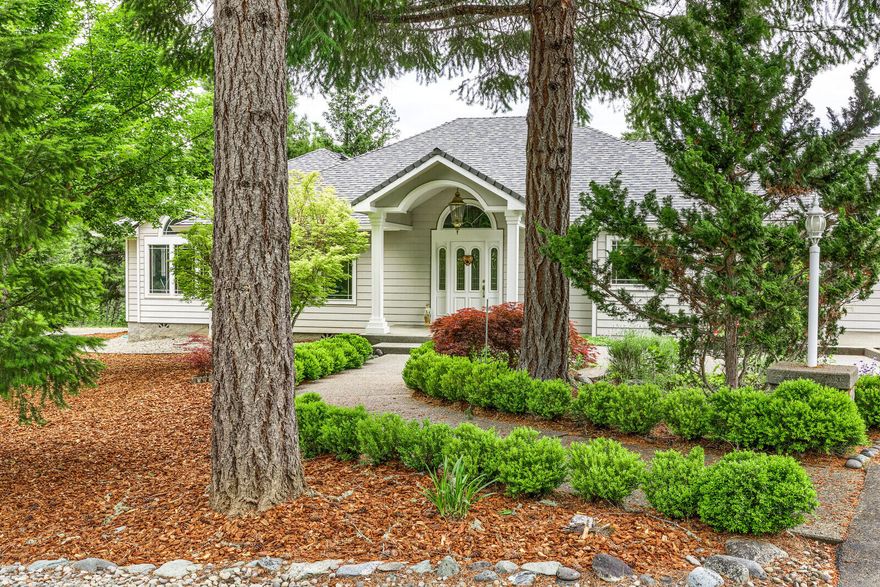 Bold Exquisite Luxury, this 4200+ Sqft house has solid Alder doors, Cherry wood kitchen cabinets and Granite counter tops through out the home. Guest quarters in shop w/bathroom & shower & washer/dryer. There are klipschorn surround ceiling speakers in the master bedroom & ceiling speakers in the kitchen, master bathroom & on the patio.  Home delivers spectacular grounds including a 30 x 60 fenced garden area with Strawberries, Grapes, Tomatoes, Apples and Peach trees.The shop is 2040 Sq.Ft. with 4 bays for additional parking or workshop. There is a full bath and washer & dryer connections. There is also a 23 x 25 ft. dog run attached to the dogs covered enclosure. Find Exceptional details expected in a Luxury Estate Property with the Gourmet kitchen equipped with Sub-zero fridge,walk-in pantry, & high end appliances.. The Master Suite offers a Walk-in closet with custom cabinetry, sitting area & spa-like bathroom retreat with heated tile floors. House generator too.