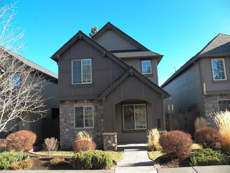 **Open House CANCELLED, accepted offer**. Enjoy this well maintained & roomy 3 bedroom, 2.5 bath home located across the street from the private community pool, clubhouse, sports complex and play structure in The Bridges. The great room features a cozy fireplace and is open to the kitchen & dining. The kitchen has nice tile countertops, pantry, gas range and laminate floors. All three bedrooms and 2 full baths fit comfortably upstairs to complete this floor plan. The spacious master suite includes dual sinks & a walk in closet. You'll be comfortable year round w/ a gas forced air furnaces & A/C. On the exterior this home features a dramatic two-story courtyard, adding outdoor living space. Near schools & shopping yet tucked in a private community. Don't miss this wonderful home!