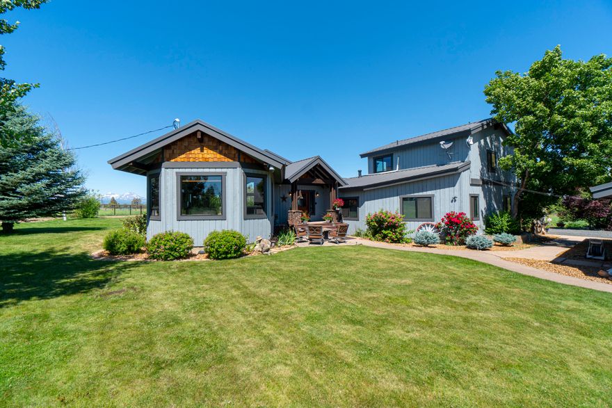 This is a lovely farm property in Tumalo with breathtaking cascade mountain views! This home has had countless thoughtful updates
including a new metal roof, kitchen remodel, siding, windows, carpet and flooring, surround sound, Motorized Lutron shades and many more updates. On the exterior of the home enjoy shade under the mature trees and gazebo. The 6 stall barn with tack room and security cameras on all of the stalls so you can watch your animals anytime of day. There is an outdoor arena, large detached garage and a heated shop area with attached sauna and pet room/kennel. There is 1 utility shed for extra storage as well.