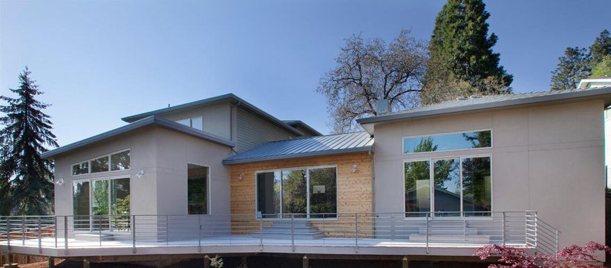 Stunning 2011 custom home on a very private flag lot in Downtown Ashland!  Gorgeous grounds surround this modern home that features a main level master suite with two talk-in closets, gourmet kitchen, peaceful decks and courtyards, gas fireplace and vaulted ceilings. Upstairs you will find two bedrooms and a full bath.  Attached 2-car garage.  This home is perfect for entertaining or your quiet oasis right in town!  Note that this home cannot be viewed from the street!  Please call for a tour today!