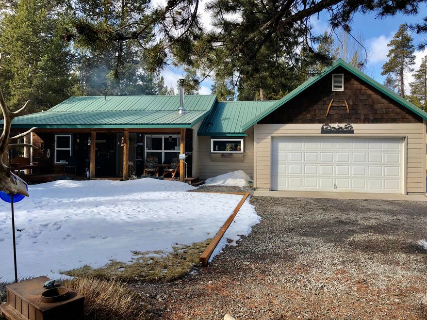 Don't miss this Beautiful well maintained 3 bedroom 2 bath Frame Home. Built in 2000 on just over an Acre located on a paved road.  Property is fenced with gaited access.  Home features an attached two car garage as well as a 30x40 shop.  The Shop is wired for 220, with multiple plug ins and an area that can be closed in with heat.  Large carport or wood storage. Woodstove, new vinyl flooring, metal roof, beautifully landscaped yard, and a Greenhouse.   This property has all you will need to make your forever home in Beautiful La Pine Oregon!