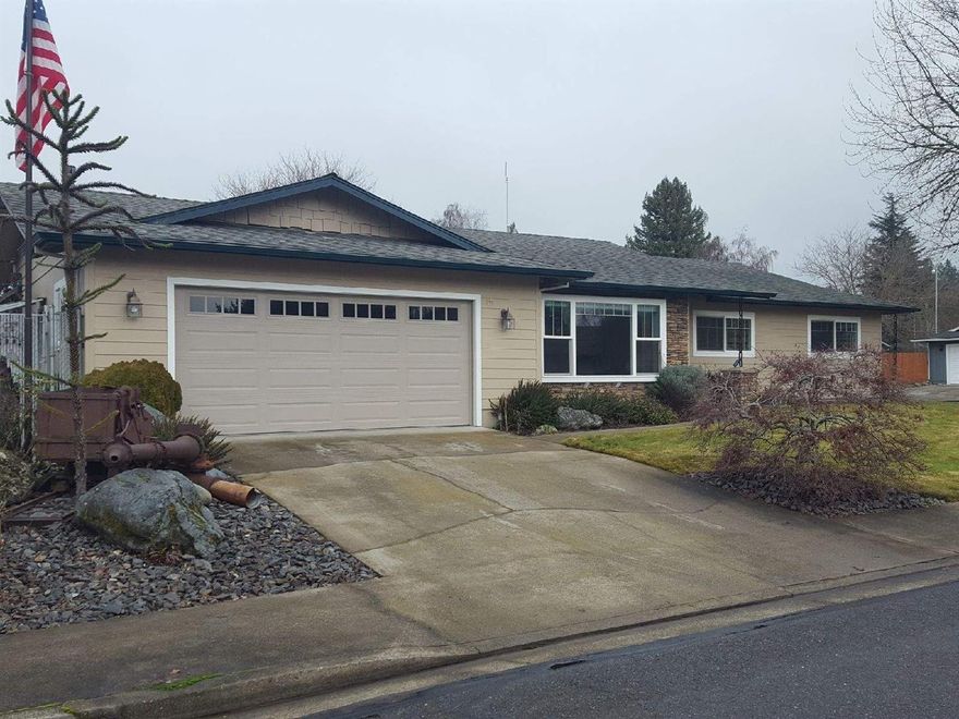 Immaculate and updated home located in nice neighborhood close to the hospital, town and shopping, updated in 2010 with new kitchen features corian counter tops & tile back-splash, stainless steel appliances, new vinyl windows, 2- 2-car garages, Large corner lot with covered RV parking, 12X15 office & nice back yard w/raised garden beds, water features in the front. and much more.