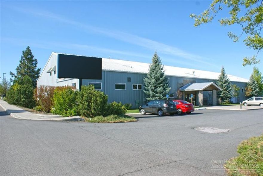 To be vacant industrial building located on a large 1.60 lot with excess parking. Highly visible and great access directly off Hwy 20 or Hwy 97 (business). Zoned Light Industrial. Previous use was a sports complex/gymnastics center. Current occupant is month to month.