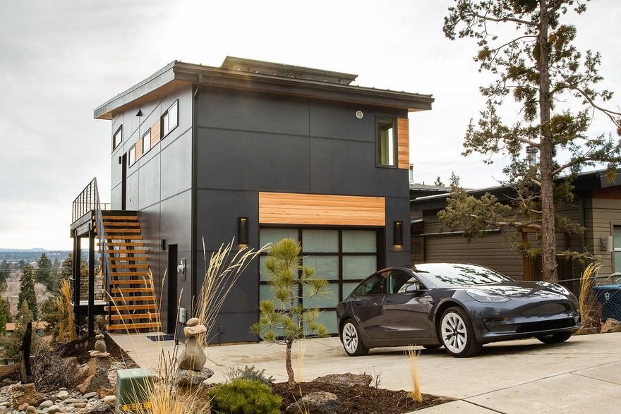 Located on Bend's coveted westside, Hiatus Roanoke features energy efficient & beautifully designed 2 bedroom & 2 bath homes.  Stunning views showcase The Old Mill iconic smokestacks, Paulina Peak, Mt Bachelor, & Downtown Bend. These high-end homes include engineered hardwood flooring, quartz countertops, standing seam metal roof, vaulted ceilings & panoramic 3-paneled accordion deck door that lets the natural light flood in. Join the small living movement with one of the most energy efficient homes on the market.
Home is built 40-50% more energy efficient than the average home built to current building code, materials are non-toxic, HRV clean air exchange system included and all homes are  Net Zero Ready- (in wall wiring provides for a solar system to be added in the future – when the system is added all the energy required by the average homeowner will be supplied by the solar system) All this and walking distance to Newport corridor and downtown.