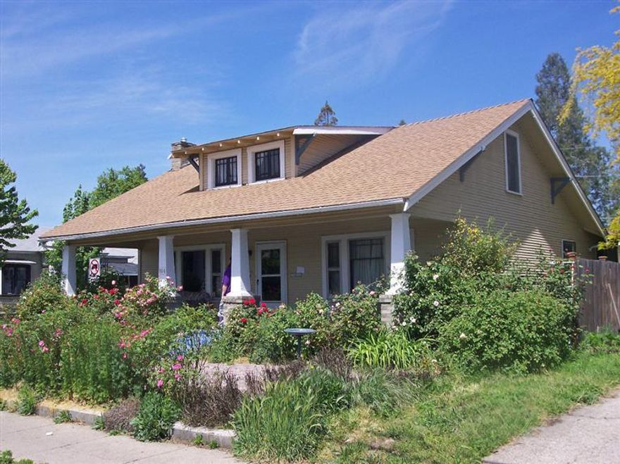 A great value awaits you at this 4-bedroom, 2-bath, 2-story Craftsman style home on a corner lot. The upgrade began in 1996 with the remodel of the upstairs into a bedroom with a full bath, and reflects pride of ownership. Rewired with ground outlets, and the original oak hardwood floors were restored in 2008. New 30-year roof and paint in 2005. Electric and gas heat and wall-mounted air conditioners are on both floors. Lots of built-in storage! Handicap accessible inside and out, including a wheelchair ramp to access the new deck out back. The landscaping and garden are mature, and roses and vegetables are an annual favorite. This is the perfect home for a growing family! Single-car detached garage.