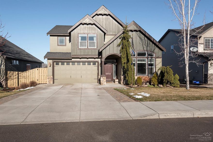 Beautiful well maintained home in desirable quiet neighborhood located in SW Redmond with Cascade Mountain views. Popular floor plan featuring 3 bedrooms, 2.5 baths, bonus room and den. Open great room with gas fireplace and tile surround plus access to entertaining size back deck. Kitchen featuring stainless steel appliances, slab granite counters with custom tile backsplash, cabinet organizers and pantry. Main floor den with tall ceilings and many windows. Spacious master suite separated from other bedrooms. Master bath with tile counters, soaking tub and large walk-in closet. Upstairs bonus room with double door entry. Convenient upstairs laundry room with built-ins. Additional features are central vacuum system, central AC, surround sound, .21 acre landscaped lot with fenced backyard. Summit Crest neighborhood offers a park with covered picnic area and basketball courts. Great location off SW Helmholtz Way and SW Wickiup Ave. with easy access to downtown Redmond, Airport and Bend.<