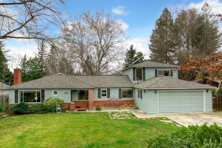 What a find in Old East Medford! Gorgeous .38 acre flat, mature yard with Koi pond and a great home just minutes to Hoover Elementary and Holmes Park. The home has a sunny open floor plan, 4 bedrooms, 2 baths and a separate office off of the family room. The living room has a beautiful fireplace, built in shelves and original hardwood floors throughout most of the first floor. There is new carpet, new interior paint in 2017 and new roof and new gutters in 2013. Separate formal living room and family room, plus lots of storage in the laundry room with a sewing desk and laundry chute from the upstairs bathroom. RV/boat parking to the side of the home and a wonderful deck off the back of the home to enjoy the large private backyard. A wonderful home in a great classic neighborhood.