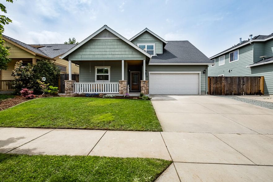 Beautiful 4 bedroom 2.5 bath home in desirable location! Walking distance to South Medford High School and in Griffin Creek School district this home has it all. The open floor plan is complemented with large vaulted ceilings and bright natural light. The main level master offers a slider to the back yard and a large walk in closet. Upstairs are 3 bedrooms, a full bath and lots of storage space. The backyard offers plenty of room for a garden, room to play and entertain.