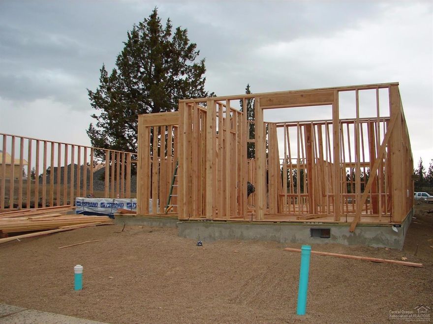 New, nearly completed luxury single-level home w/great room, Amazing kitchen w/ solid surface counter tops, beautiful custom cabinetry with built in buffet, large pantry & stainless steel appliances w/rock surround gas fireplace & large dining area. Spacious master suite, very large walk-in to die for closet! Front office or 4th bdrm A/C. Real tandem triple-car garage completely sheet rocked & insulated. Plenty of storage and RV Parking on side. Covered front porch and back patio