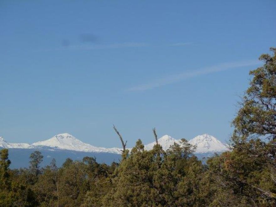 You will be King of the Hill on this Brasada Ranch acre+ homesite. The 5 mountain view includes Mt. Bachelor, Broken Top, South, Middle and North Sister. This property backs up to common land, offers cul-de-sac privacy, is nicely treed and is one of the larger homesites available. Golf and Athletic Club memberships included with this purchase. A unique opportunity to live in a premier Central Oregon neighborhood.