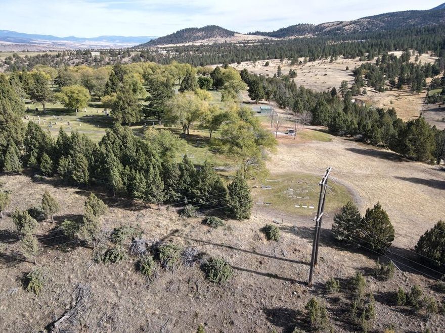 This nice 2.44 acre property is set up and ready to go. It has power on the property, and is hooked to city water and sewer. The house pad has been put in; graveled, leveled and waiting for your new home and shop. Another great feature: all the trees on the property have been limbed up to about 5 ft. to help with fire suppression. This property has been surveyed and is possibly dividable. Come and see this nice place that has everything that you need ready and waiting.