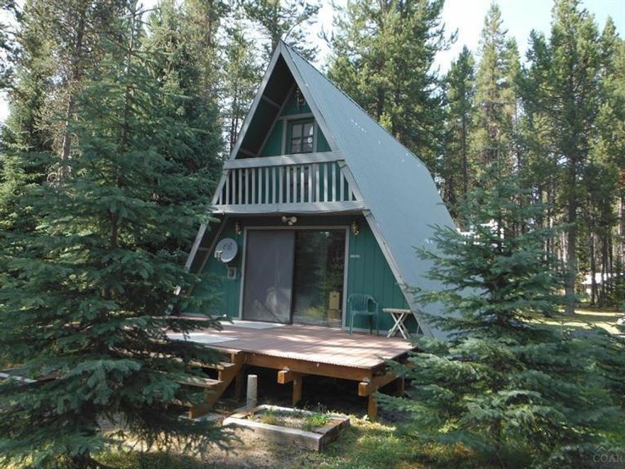 Owner will carry contract with sufficient down. Motivated seller. Adorable 972 sq ft chalet with 3 bedrooms, 1 bath, woodstove, forced air, 2nd floor entertaining deck, Juliet balcony, massive RV garage is 42 x 26 for all your toys and your motorhome with room left over for a work bench, gravel circular drive all on 1 acre corner lot. Minutes from Crescent & Odell Lakes, Willamette Ski Pass, Pacific Crest Trail or snowmobile from your front yard. 3rd bedroom houses washer and dryer but can be moved.